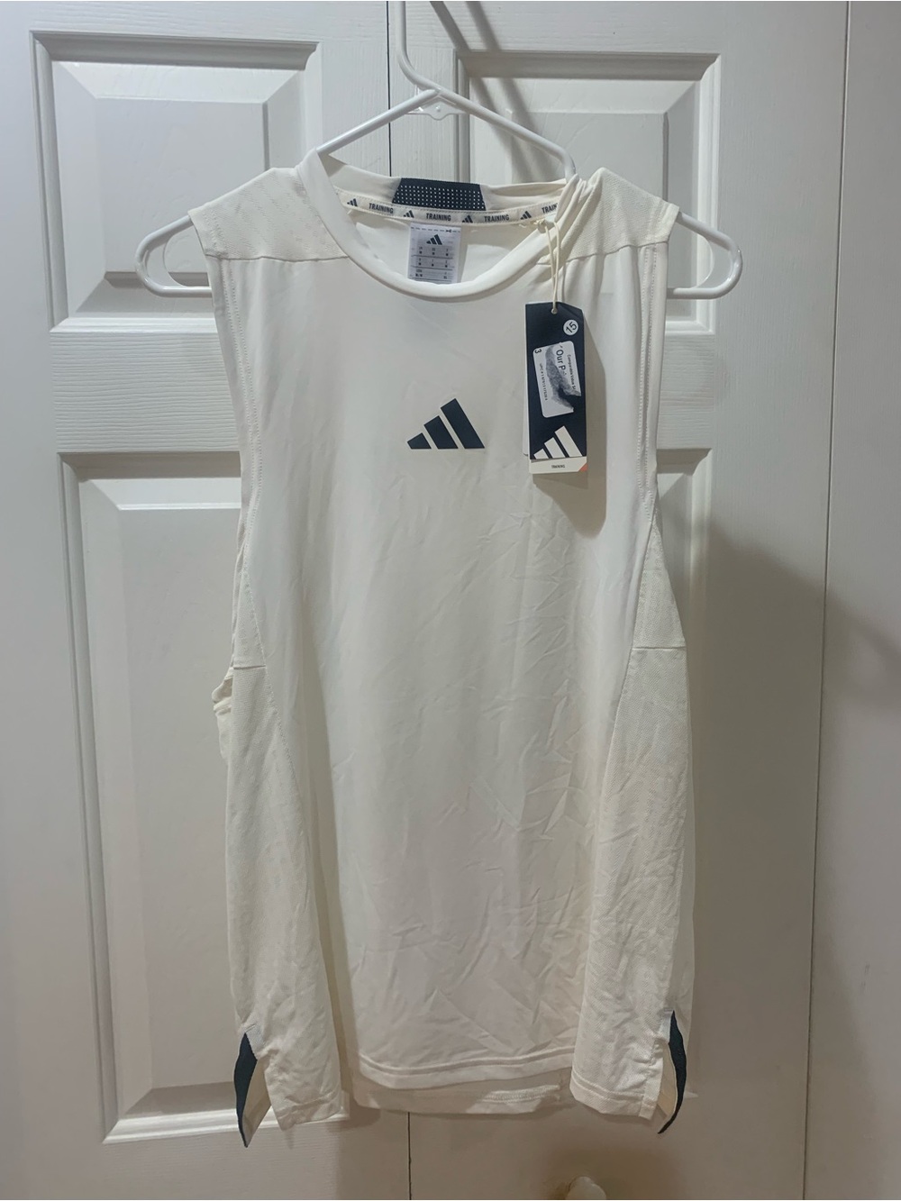 Men’s Adidas training tank size medium.